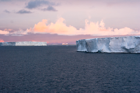 Tabular icebergs with cloud formations